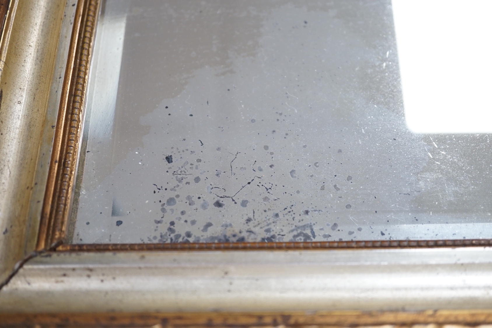 A pair of squared bevelled wall mirrors (2) 29cm sq including frames